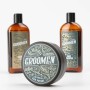 Zestaw-Groomen-do-ciala-i-wlosow-zawiera-czarna,-matowa-pomade-w-puszce-oraz-brazowe,-szklane-butelki-szamponu-i-odzywki,-wszystkie-na-bialym-tle-podkreslajacym-detale-i-czytelne-etykiety..jpg
